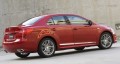 La Suzuki Kizashi vient en tenue de sport à Paris