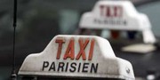 Les taxis parisiens passent au feu rouge