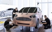 Une petite iQ badgée Aston Martin en cadeau pour les acheteurs de DBS, DB9 ou Vantage