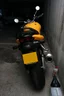 divers moto Suzuki SV650N jaune
